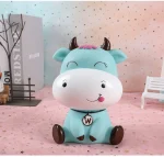 figurilla hucha vaca