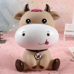 adorno con hucha vaca